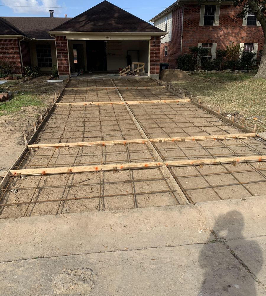 Driveway formed and reinforced with rebar before the pour
