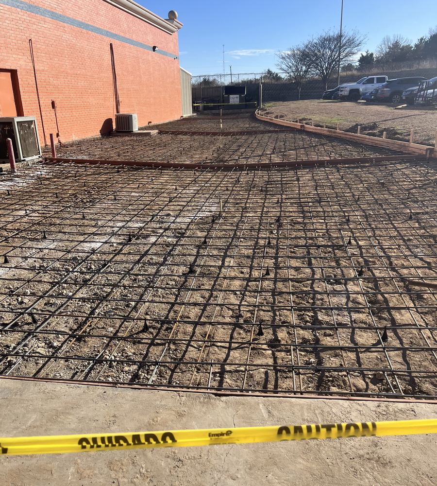 Commercial slab reinforced with rebar grid before pouring